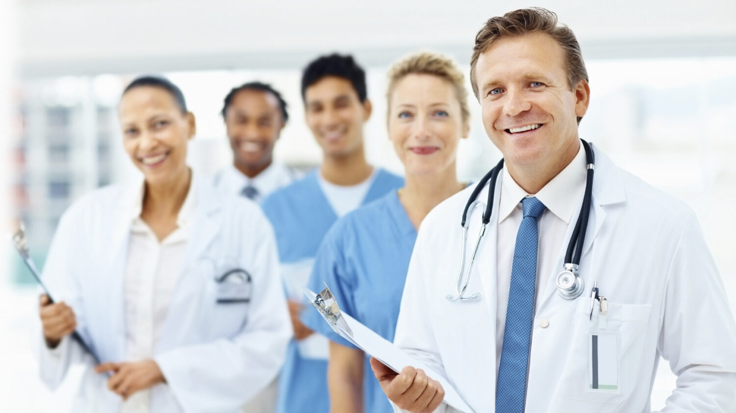Successful team of doctors, female with the clipboard
