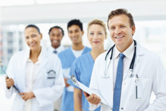 Successful team of doctors, female with the clipboard